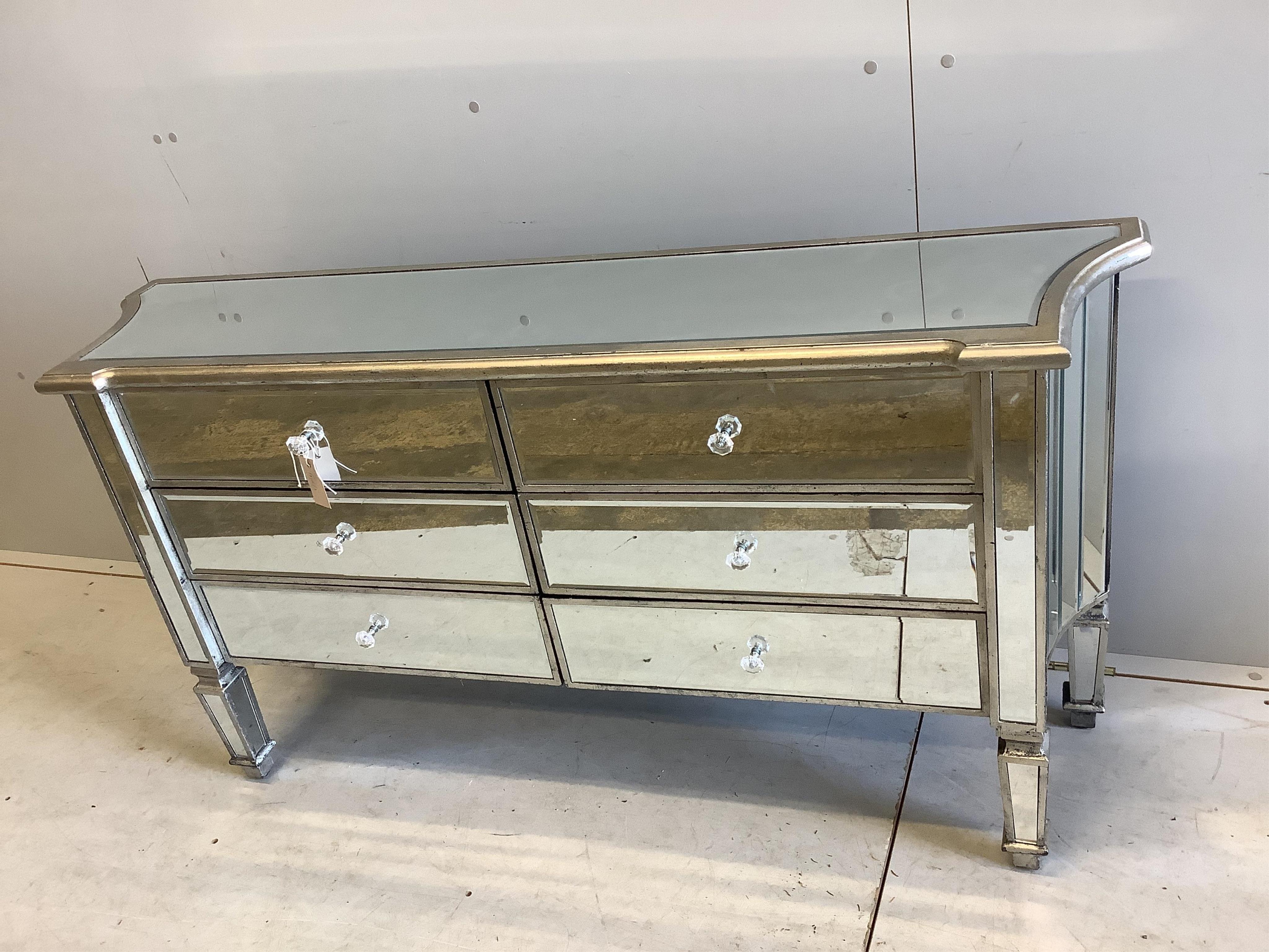 A Contemporary mirrored chest of drawers, width 138cm, depth 34cm, height 73cm. Condition - good